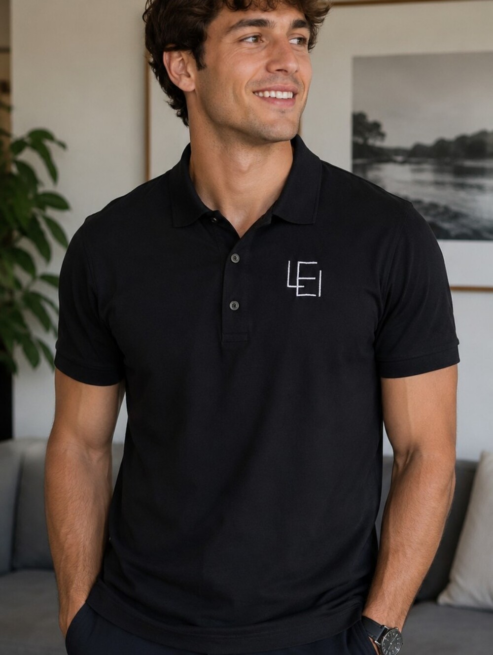 Greg Norman Collection Black Polo with LEI Embroidered Logo